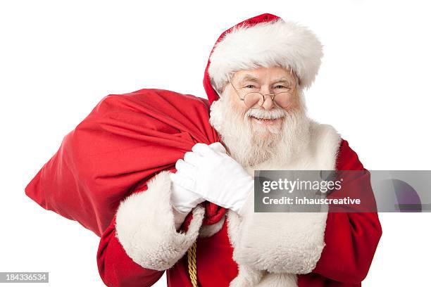 pictures of real santa claus has a gift bag - kerstman stockfoto's en -beelden