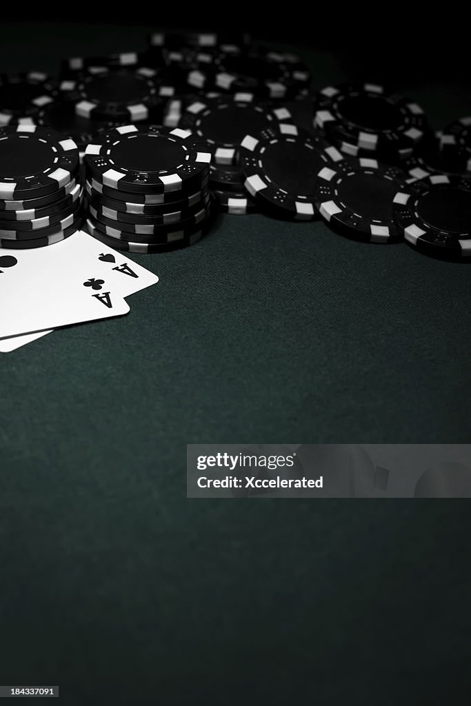 Pocket Aces with Black Poker Chips