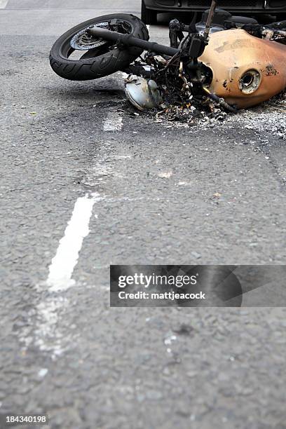 burnt auf motorrad - motorcycle accident stock-fotos und bilder
