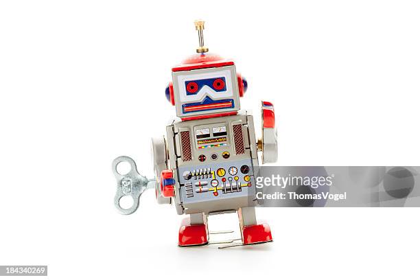 retro tin toy walker robot - robot stock pictures, royalty-free photos & images