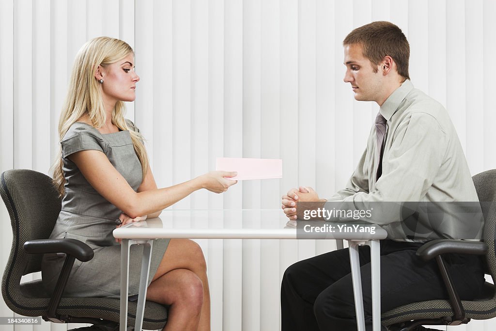 Businessman Receiving Business Downsizing and Layoff Notice
