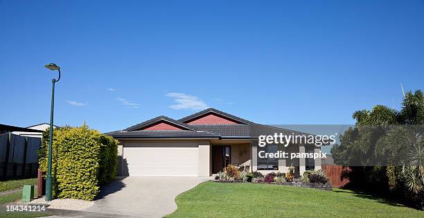 front view of bungalow style home - tile roof stock pictures, royalty-free photos & images