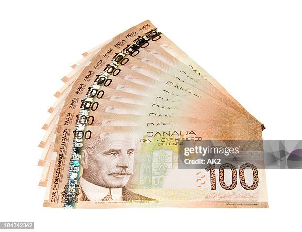 canadian 100 dollar bills - canadian dollars stock pictures, royalty-free photos & images