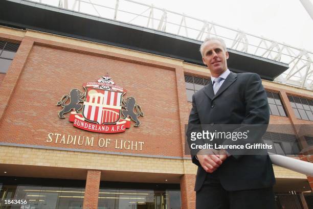 Mick McCarthy poses outside the stadium after being announced as the new manager of Sunderland during a press conference on March 12, 2003 at The...