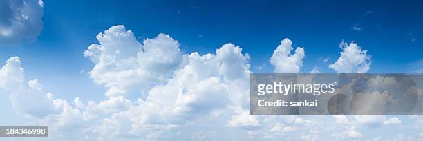 panoramic shot of sky with giants cumulonimbus clouds - panoramic stock pictures, royalty-free photos & images