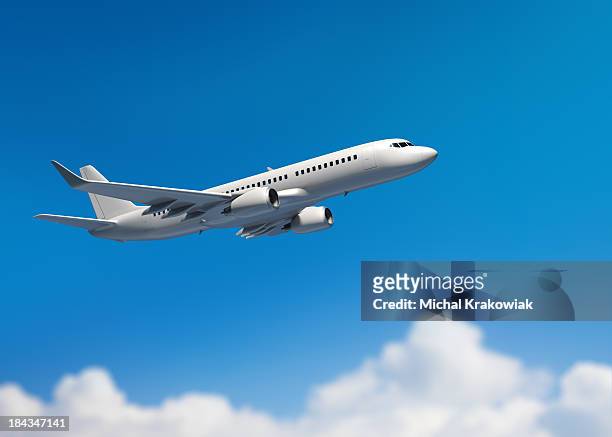 white mid-sized passenger jet airplane - air travel stock pictures, royalty-free photos & images