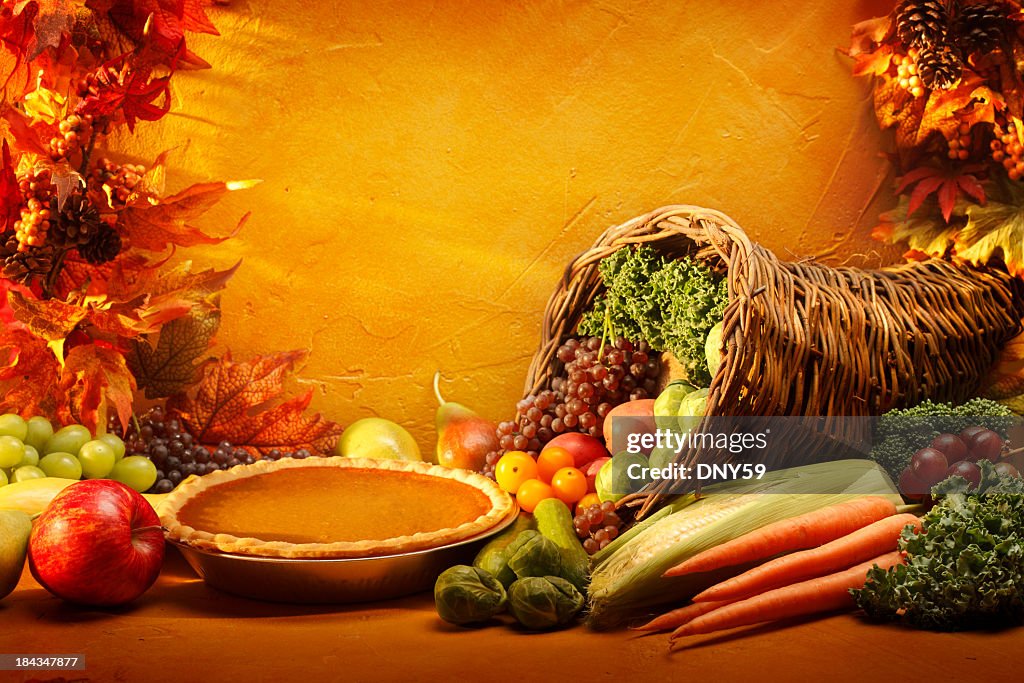 Pumpkin Pie and Cornucopia in an autumn setting