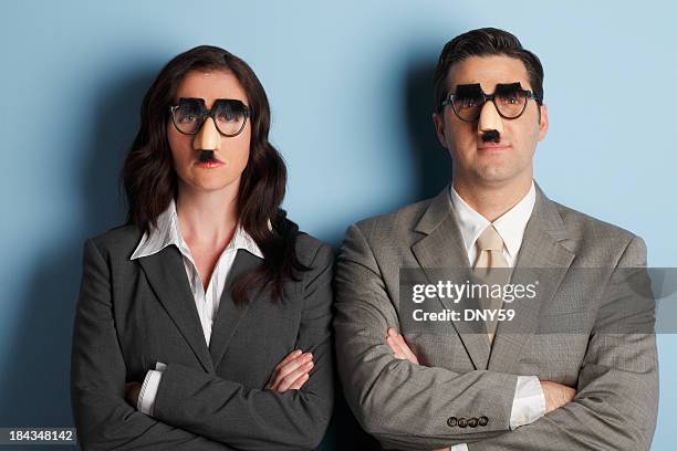 teamwork - groucho marx disguise stock pictures, royalty-free photos & images