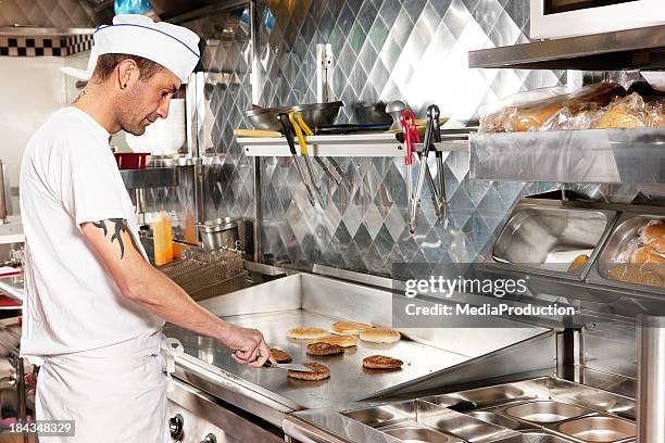 fry cook - chef burger stock pictures, royalty-free photos & images