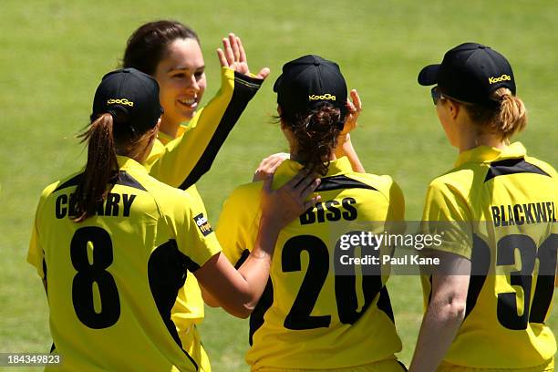 Emma King of the Fury celebrates a wicket with Emma Biss during the WT20 match between the Western Australia Fury and the ACT Meteors at the WACA on...