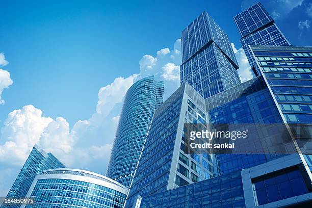 high modern skyscrapers over blue sky - cloudscape buildings stock pictures, royalty-free photos & images