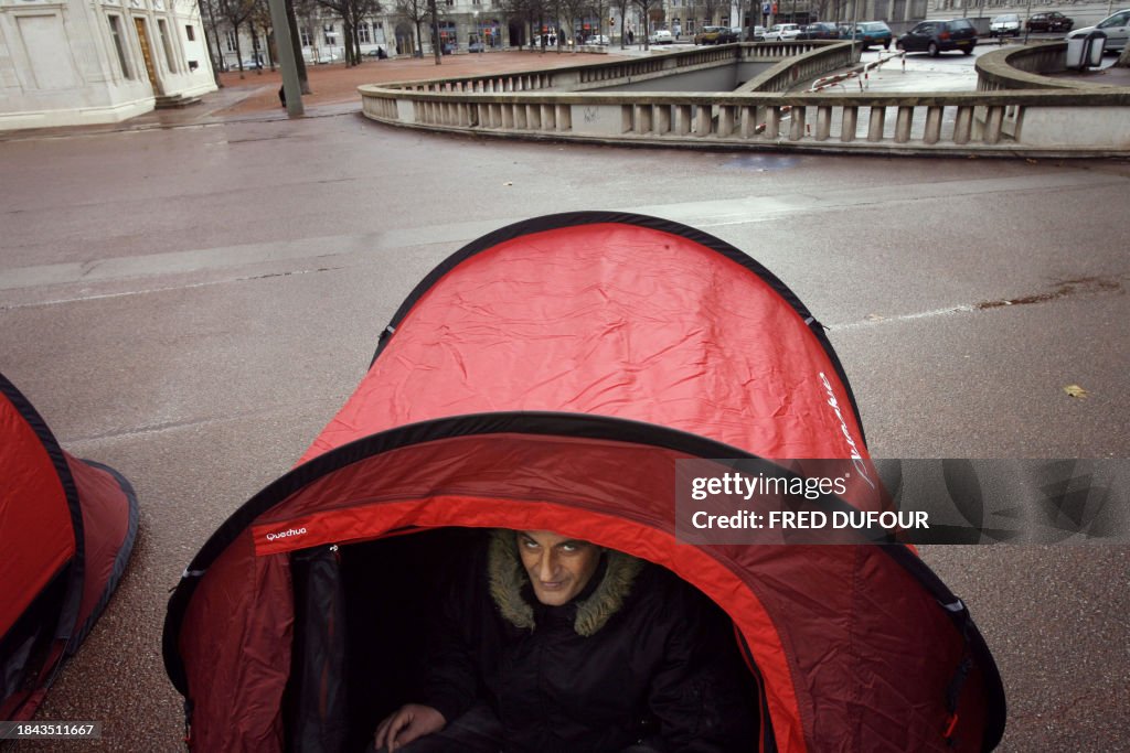 Poverty In France A homeless waits in a tent, 02 January 2007 in Lyon, central eastern ...