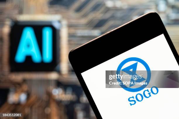 In this photo illustration, the Japanese department store chain Sogo logo seen displayed on a smartphone with an Artificial intelligence chip and...