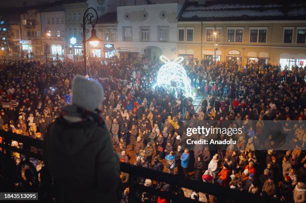 People gather to take part in demonstration along the Main Street of Kosice, Slovakia on December 12 as protests are persisted throughout the...