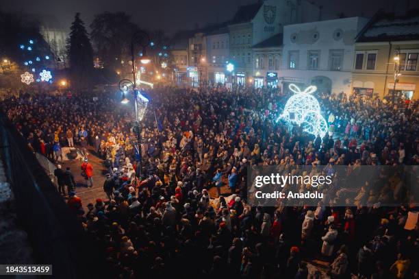 People gather to take part in demonstration along the Main Street of Kosice, Slovakia on December 12 as protests are persisted throughout the...