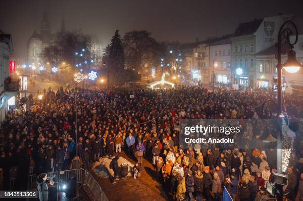 People gather to take part in demonstration along the Main Street of Kosice, Slovakia on December 12 as protests are persisted throughout the...