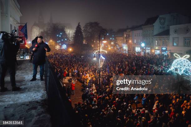 People gather to take part in demonstration along the Main Street of Kosice, Slovakia on December 12 as protests are persisted throughout the...