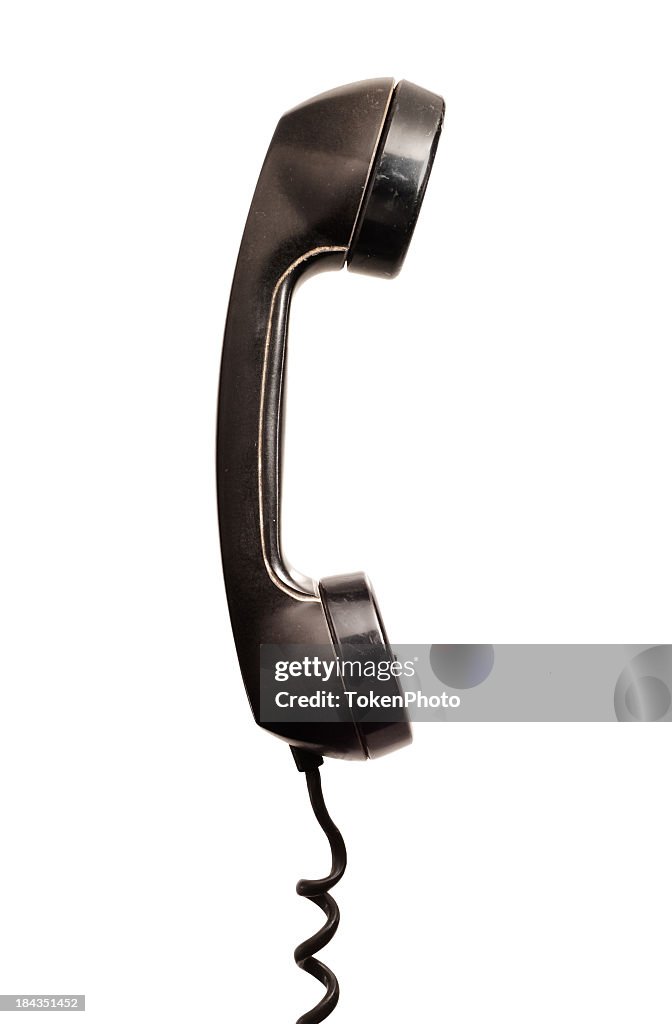 A black corded telephone mouth and earpiece