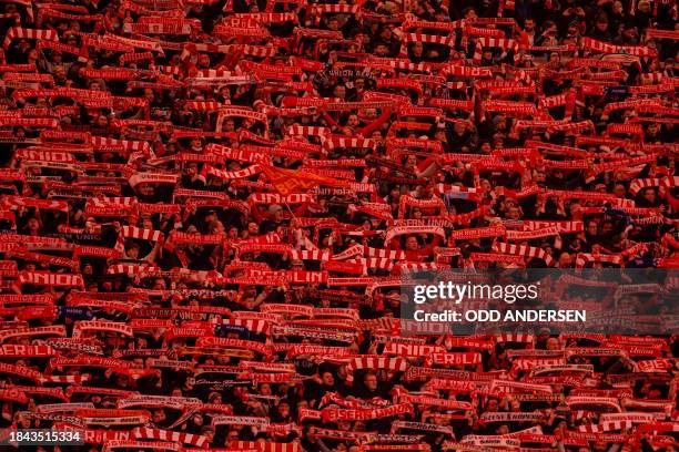 Fans of Union Berlin hold up scarves ahead the UEFA Champions League group C football match between Union Berlin and Real Madrid in Berlin, on...