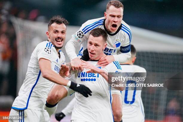 Copenhagen's Danish midfielder Lukas Lerager celebrates scoring the 1-0 goal during the UEFA Champions League group A football match between FC...