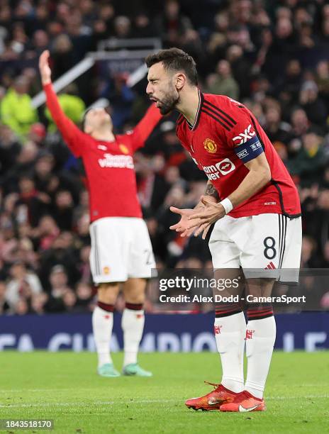 Manchester United's Bruno Fernandes rues a missed opportunity during the UEFA Champions League match between Manchester United and FC Bayern Munich...