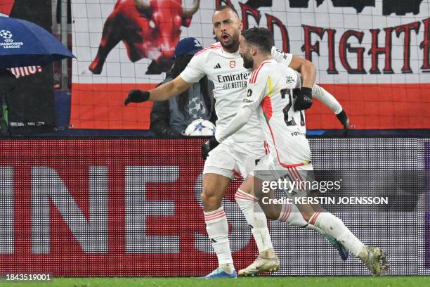 Benfica's Norwegian midfielder Fredrik Aursnes and Benfica's Portuguese midfielder Rafa celebrate after their team scored the 1-3 goal during the...