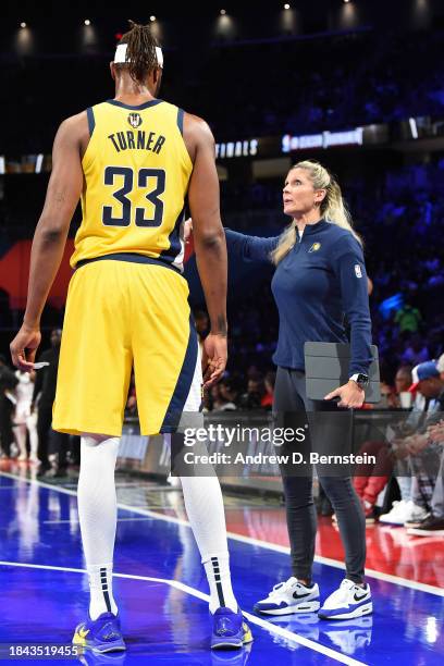 Assistant Coach Jenny Boucek of the Indiana Pacers talks to Myles Turner during the game against the Milwaukee Bucks during the semifinals of the...