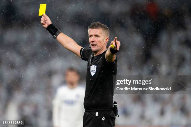 Referee Daniele Orsato shows yellow card during the UEFA Champions League match between F.C. Copenhagen and Galatasaray A.S. At Parken Stadium on...