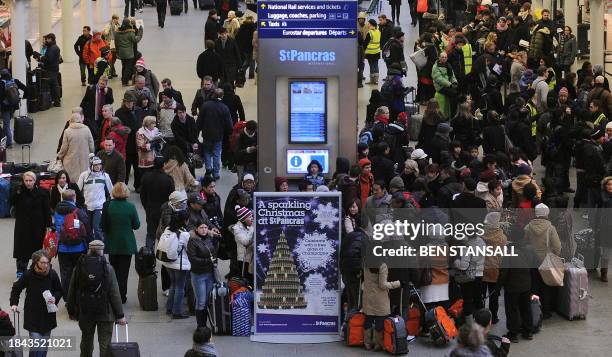 People fill St Pancras International station, where the Eurostar check-in desks are based, in London, on December 21, 2010. Thousands of angry...