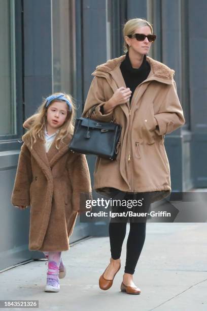 Nicky Hilton and her daughter Lily are seen on December 12, 2023 in New York City.