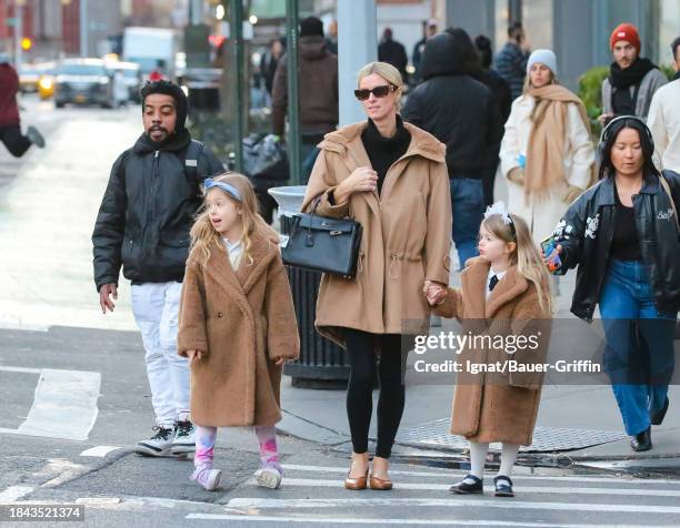 Nicky Hilton with her daughters Lily and Teddy are seen on December 12, 2023 in New York City.