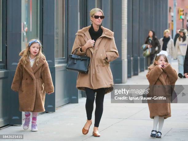 Nicky Hilton with her daughters Lily and Teddy are seen on December 12, 2023 in New York City.