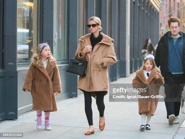 Nicky Hilton with her daughters Lily and Teddy are seen on December 12, 2023 in New York City.