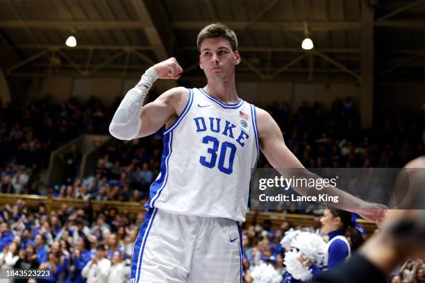 Kyle Filipowski of the Duke Blue Devils reacts after a basket and a foul call during the first half of the game against the Hofstra Pride at Cameron...