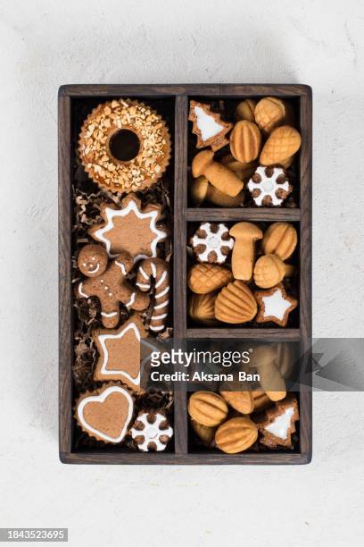 christmas box with cookies. white background. top view - rustic star stock pictures, royalty-free photos & images