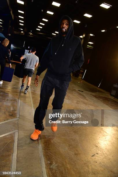 Kevin Durant of the Phoenix Suns arrives to the arena before the game against the Golden State Warriors on December 12, 2023 at Footprint Center in...