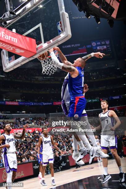 Daniel Theis of the LA Clippers dunks the ball during the game against the Sacramento Kings on December 12, 2023 at Crypto.Com Arena in Los Angeles,...