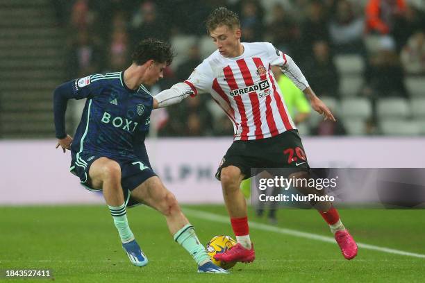 Jack Clarke of Sunderland is taking on Archie Gray from Leeds United during the Sky Bet Championship match at the Stadium of Light in Sunderland, on...