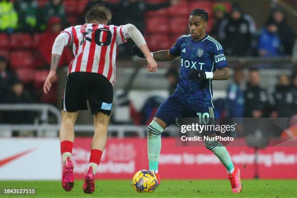 Crysencio Summerville of Leeds United is running at Jack Clarke of Sunderland during the Sky Bet Championship match between Sunderland and Leeds...