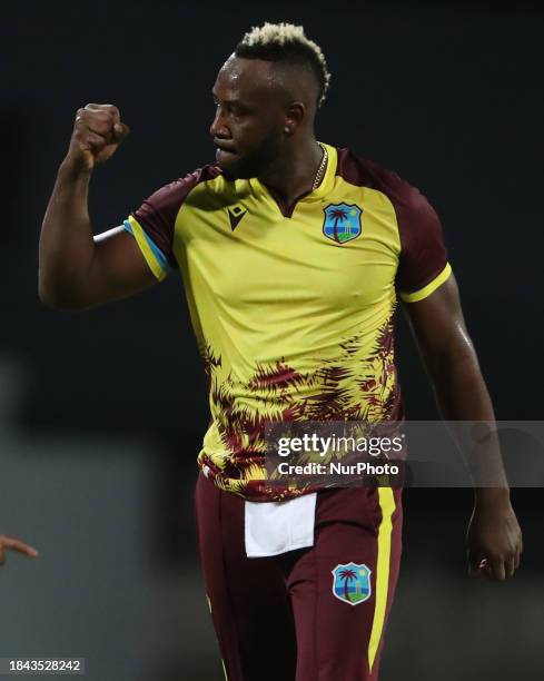 Andre Russell is celebrating after dismissing England's Rehan Ahmed during the 1st CG United T20 International match between West Indies and England...
