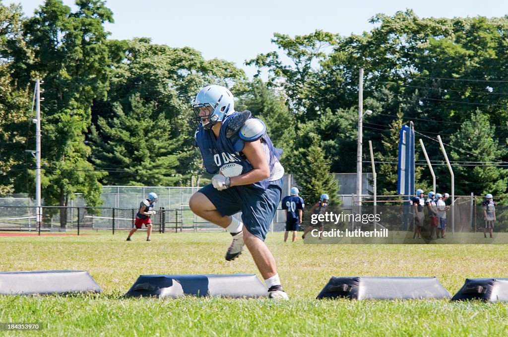 High school football player training