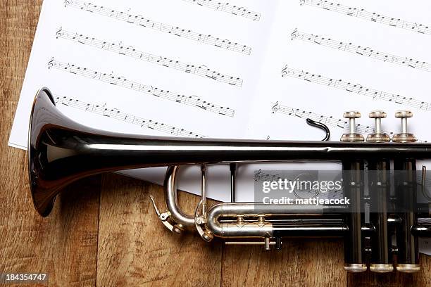 trumpet and music - brass band stock pictures, royalty-free photos & images