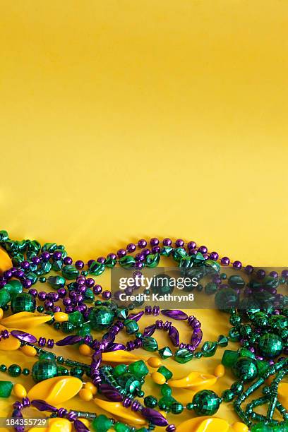 mardi gras beads - beads stock pictures, royalty-free photos & images