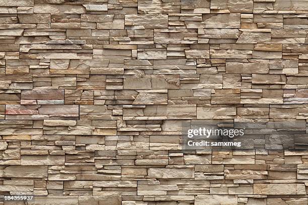 the stone wall would be great for the outside of a house - brick pattern stock pictures, royalty-free photos & images