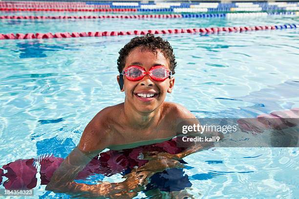 boy in swimming pool - swimming lanes stock pictures, royalty-free photos & images