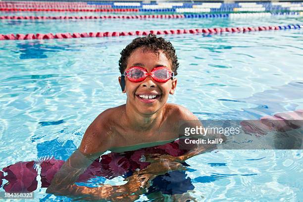 boy in swimming pool - simglasögon bildbanksfoton och bilder