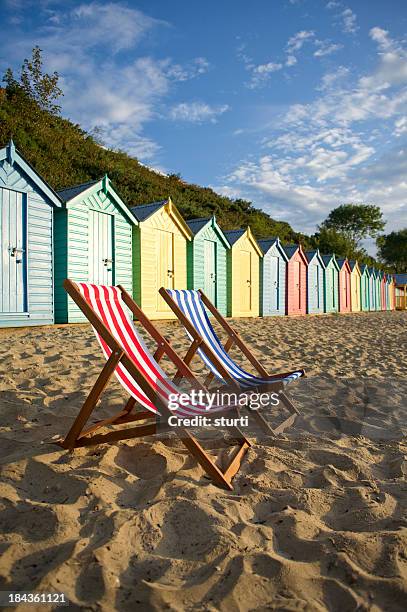 summer is here - beach hut stock pictures, royalty-free photos & images