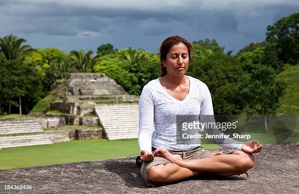 yoga at mayan ruins - belize culture stock pictures, royalty-free photos & images