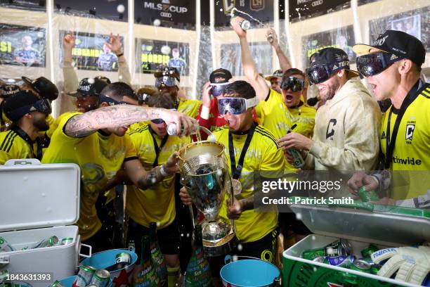 Cucho Hernández of Columbus Crew celebrates in the locker room after winning the 2023 MLS Cup against the Los Angeles FC at Lower.com Field on...