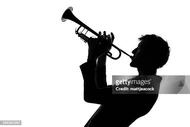 male with trumpet silhouette - jazz stockfoto's en -beelden